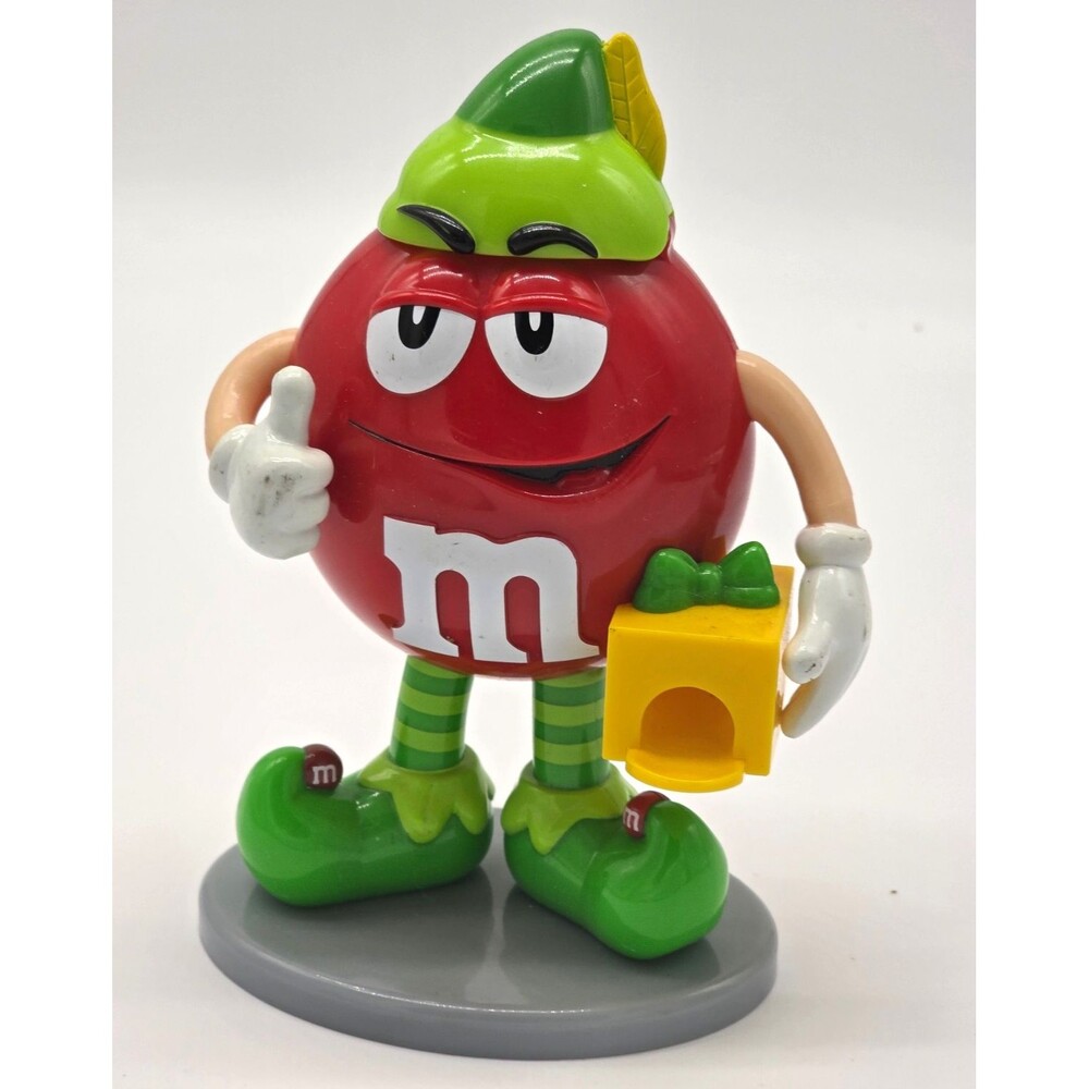 M&M's Red Character Figure w/ Green Hat & Yellow Gift Box, Gray Base